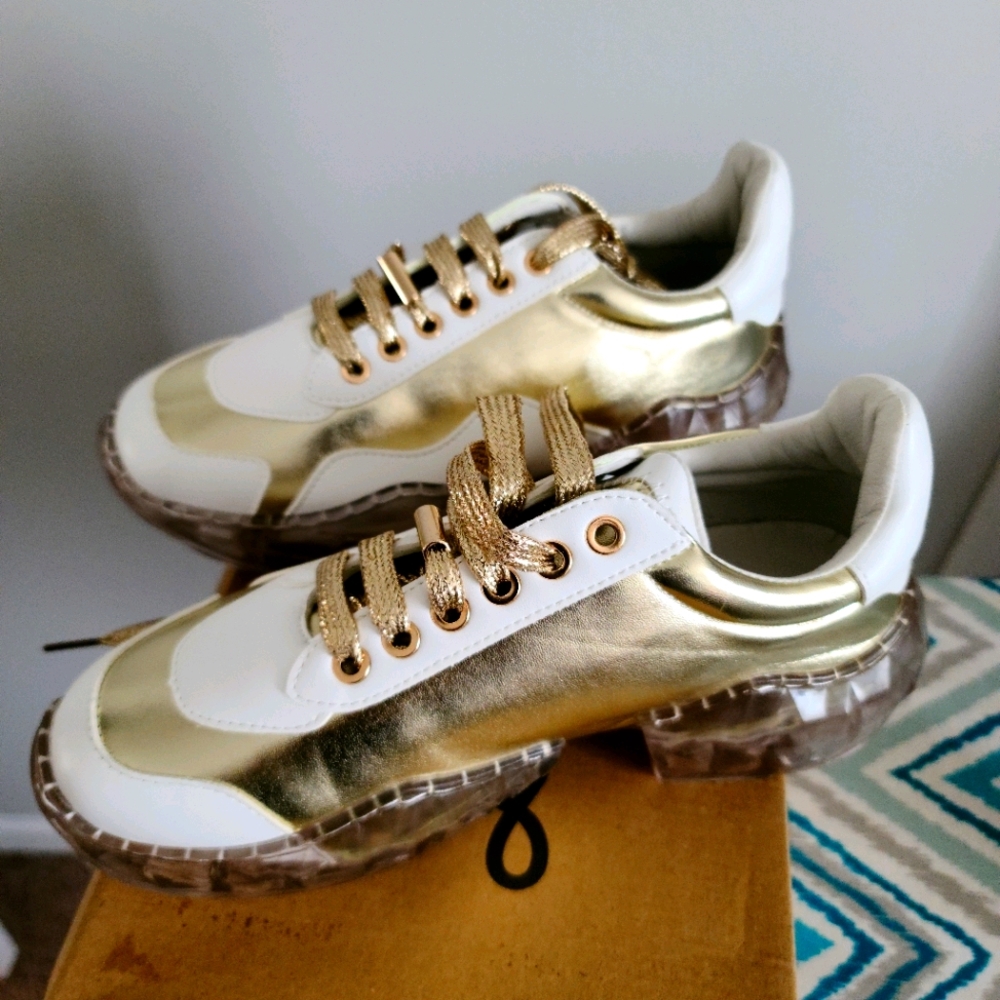 Gold/white sneakers